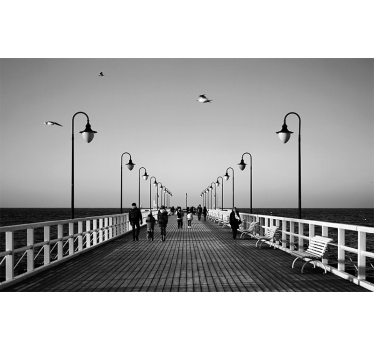 Fotomural ciudad paseo por el muelle junto al mar - TenVinilo