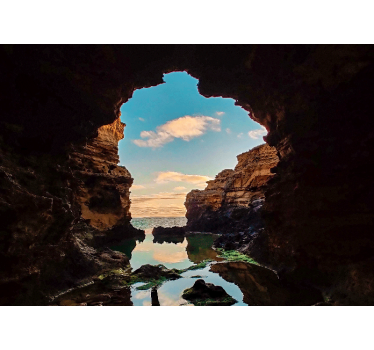 Papel pintado paisaje vista de mar en cueva - TenVinilo
