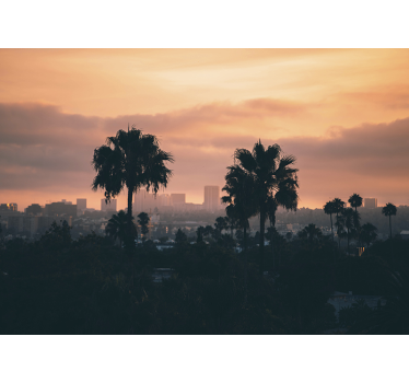 Fotomural ciudad palmeras al atardecer - TenVinilo
