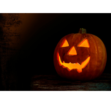 Fotomural Halloween resplandor de calabaza tallada - TenVinilo