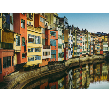 Fotomural ciudad casas coloridas frente al río - TenVinilo
