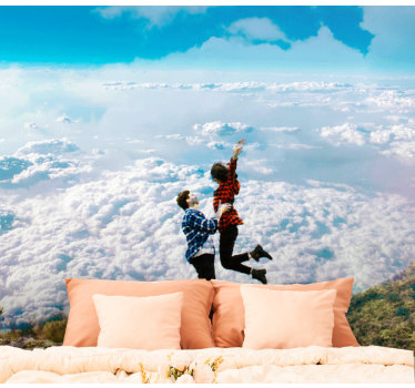 Fotomural de amor abrazo alegre por encima de las nubes - TenVinilo