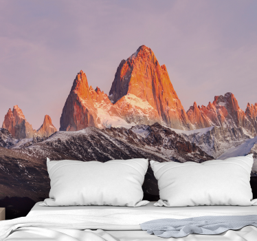 Fotomural montañas puesta de sol sobre picos nevados - TenVinilo