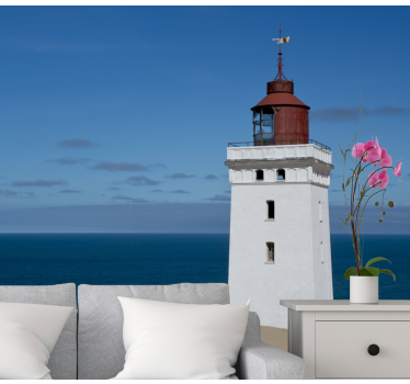 Fotomural montañas faro junto al océano - TenVinilo