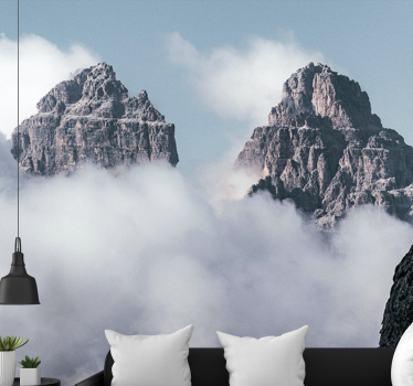 Fotomural montañas picos majestuosos sobre nubes - TenVinilo