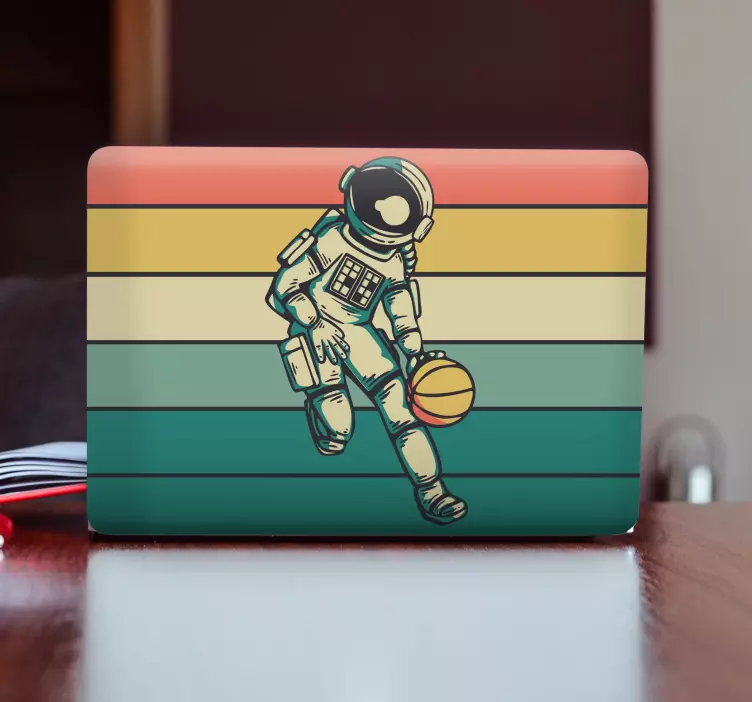 Pegatina para portátil astronauta jugando a la pelota - TenVinilo