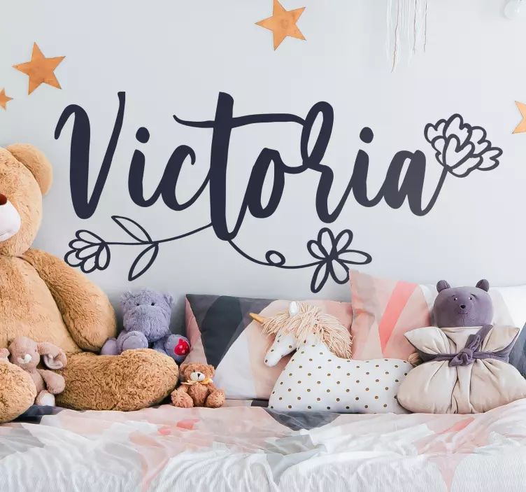 Vinilo infantil cabecero de flores personalizable - TenVinilo