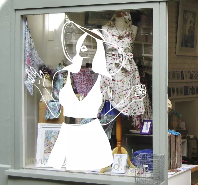 Vinilo escaparate silueta de mujer elegante - TenVinilo