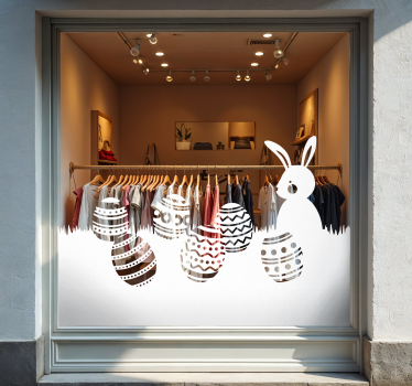 Vinilo escaparate conejito y huevos de pascua en el prado - TenVinilo