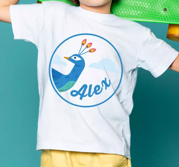 Camiseta infantil pavo real con nombre - TenVinilo