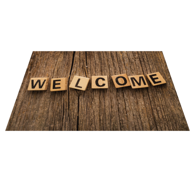 Alfombra vinílica frase bienvenida del alfabeto de madera - TenVinilo