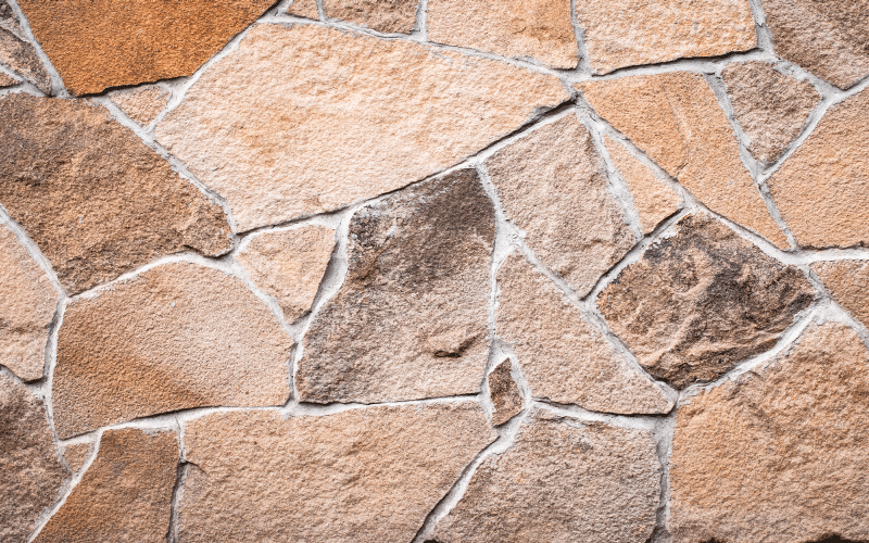Alfombra vinílica entrada ladrillos de piedra marrón claro - TenVinilo