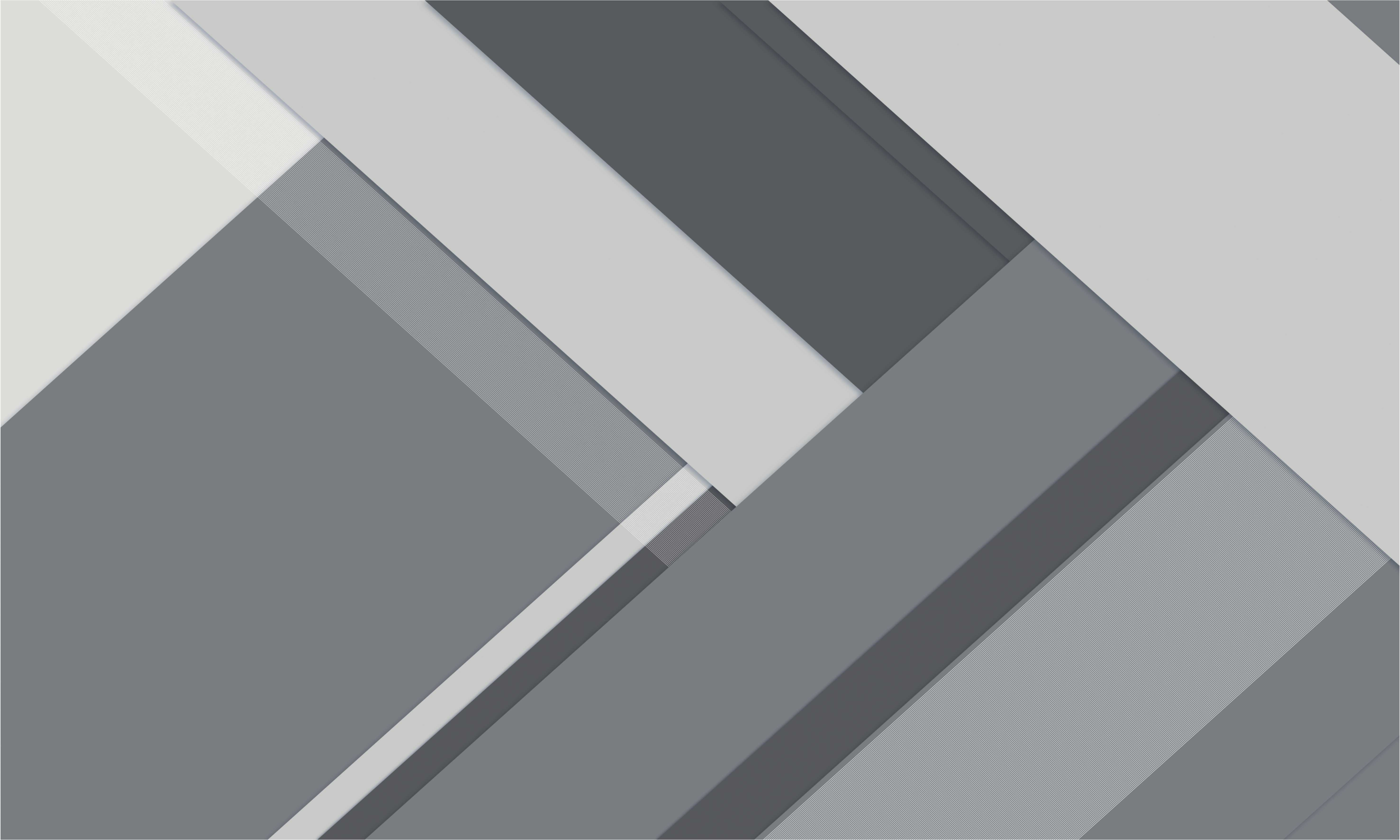 Alfombra vinílica gris geométrica para oficina - TenVinilo